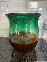 Side view of Angelo Rossi glass bowl showing amber to green gradient and flared opening