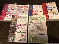 Front covers of 7 different Chicken Soup for the Soul books laid out to show various titles in the series.