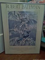 Framed poster showing Bluejay bird artwork by Robert Bateman with exhibition title.