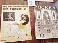 Photo showing vintage Broadway music sheet for 'Who's Wonderful - Who's Marvelous Miss Annabelle Lee' and another for 'Mickey'