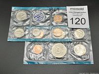 Two sealed US Mint proof-like coin sets from 1968 and 1972 showing front and back sides with coins and Bureau of the Mint certificates.