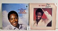 Both vinyl LP albums by Sam Cooke and Al Green side by side, showing front cover artwork.