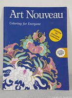 Front cover of the coloring book 'Art Nouveau Coloring for Everyone' with colorful floral design and publication details.