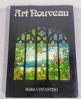 Front cover of the book showing title 'Art Nouveau' by Maria Costantino with stained glass styled nature image.