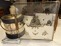 Glass tray and ice bucket with metal tongs in background, showing the full set of barware items.
