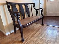 Overall side view of settee show frame and legs