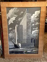 Full image of the framed architecture artwork showing a tall building and surrounding street scene.