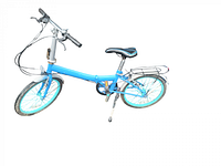 Side view of a light blue folding bike showing 20-inch wheels with sky blue rims, black saddle, rear rack, and folding frame.