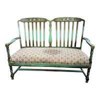 Front view of Heywood Wakefield green wood bench with floral stencil and upholstered seat cushion