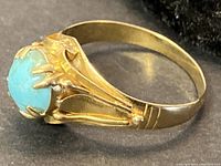 Side view showing prong setting and gallery work