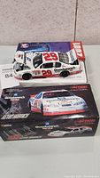 Photo of white 1:24 die cast stock car with red #29 and Goodwrench Service Plus branding on its original box.