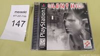 Front of PlayStation Silent Hill jewel case showing cover art and ESRB rating