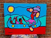 Full view of the colorful framed painting showing four figures in a canoe with a sun or balloon above.