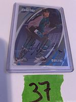 Front side of the signed Patrick Marleau hockey card showing the player in San Jose Sharks uniform and his autograph.