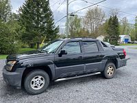 Left side profile showing overall exterior condition and side steps