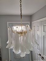 Chandelier hanging from ceiling, front view