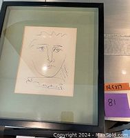 Front view of framed print showing full portrait, mat, and frame