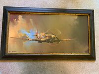 Full view of the framed painting showing aircraft and frame