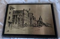 Front view of the etched stainless steel artwork depicting Bonsecours Market in Montreal, showing architectural details and artist signature.