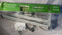 Packaged Greenway expandable drying rack in original box with visible text and graphics on the packaging.