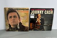 Front covers of The World of Johnny Cash (left) and The Fabulous Johnny Cash (right) vinyl albums.