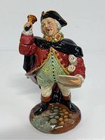 Front view of Royal Doulton Town Crier figurine showing detailed costume and expression