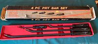 Photo of the four pry bars in red tray with measuring labels
