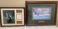 Two framed golf artwork pieces, one lithograph signed by Jim Fitzpatrick showing Amen Corner at the Masters, the other a Payne Stewart souvenir print from the 2000 Firecracker Invitational.