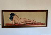 Overall frontal view of the painting in its wooden frame