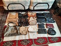 Overview of all 15 handbags in mixed colors including light and dark tones, various sizes and styles