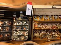 View of entire costume jewelry and pearl collection, showing jewelry box and zippered organizers with earrings and necklaces