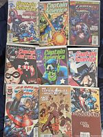 Photo showing 8 Captain America comic books with various covers including The Winter Soldier, Hulk, Civil War story arc.