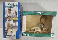 Full boxed Carl Crawford bobblehead showing running pose with Tampa Bay Rays branding.