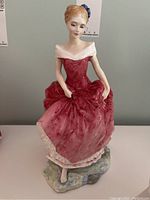 Front view of Royal Doulton Summers Day HN 3378 figurine showing detailed facial features, dress, and base.