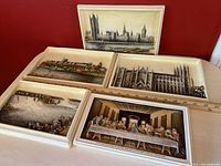 Set of 5 vintage Ivorex 3D chalkware plaques by A Osborne showing historical and religious scenes placed on table with ruler for scale