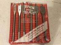Photo of Irwin Speedbor '88-Plus' 6 drill bits in original red pouch with white label showing sizes and features