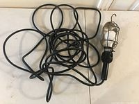 Full view of the trouble light with long power cord