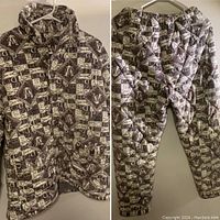 Front view of pajama pants with elastic waist and matching pattern.