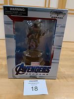 Front of the box showing Rocket Raccoon figure inside clear window with Avengers Endgame branding.