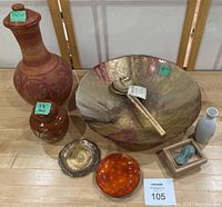 Overview photo of all items including the glass salad bowl with wooden servers, two pottery vessels with lids, small plates, small vase, and chopstick stand.