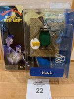 Front view of Hutch figure in original packaging showing box with Wallace & Gromit branding.