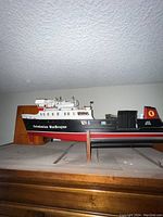 Side view showing the 'Caledonian MacBrayne' markings and color scheme of the model ferry boat.