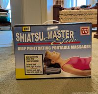 Front of box showing product name, usage, and benefits for deep penetrating massage.