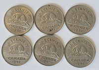 Front side of six Canadian nickels showing the beaver design, five from 1941 and one from 1942