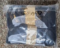 Photo of six pairs of KemisAnt compression athletic crew socks still in original packaging, shows the bag with branding and size details.