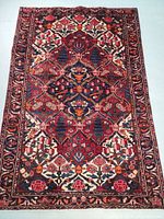 Full view of rug laid flat showing overall pattern and colors