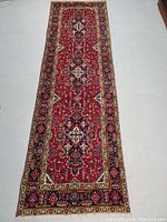 Full view of the rug laid flat on a white floor