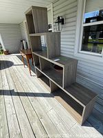 Bookshelf shown from angle highlighting the stepped design and open shelving