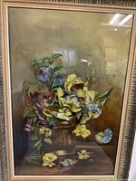Front of the framed floral still life artwork showing colorful flowers in a vase with an 18x26 size approximate.