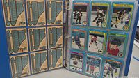 First page showing backs of cards on left and front of nine 1979 O-Pee-Chee hockey cards on right.